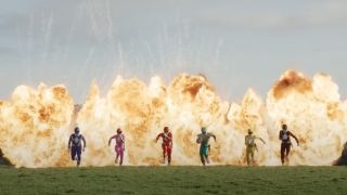 Power Rangers running with explosion behind them