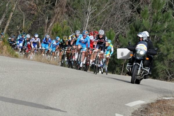 Riders get out of the saddle as the gradient steepens