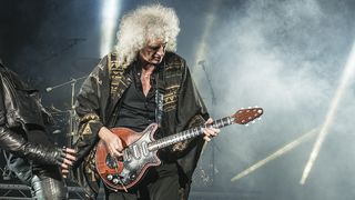 Brian May of British rock band Queen playing live onstage at the Hammersmith Apollo, July 12, 2012