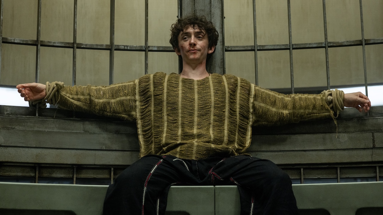Boy Kavalier in cell with arms spread open in Alien: Earth Season 1 finale