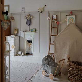 Neutral painted nursery with canvas Wendy house