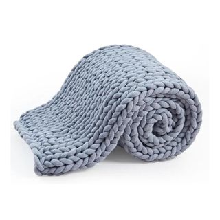 Blue rolled weighted blanket 