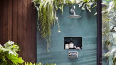 Botanical shower with shower cubby and wooden accents