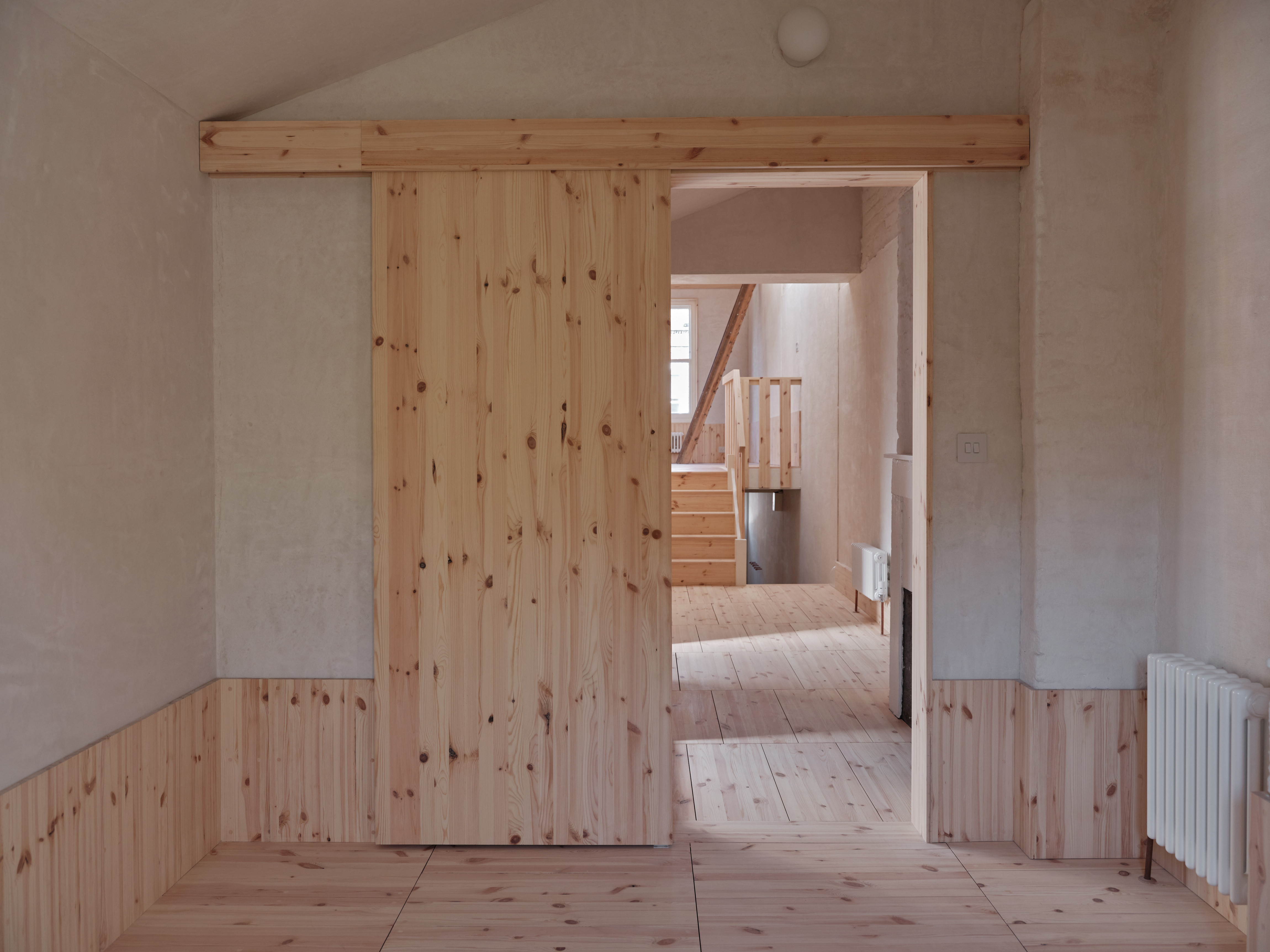 A new top hung door separates the rear of the first floor from the studio space