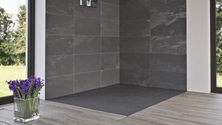 slate showering area in a corner