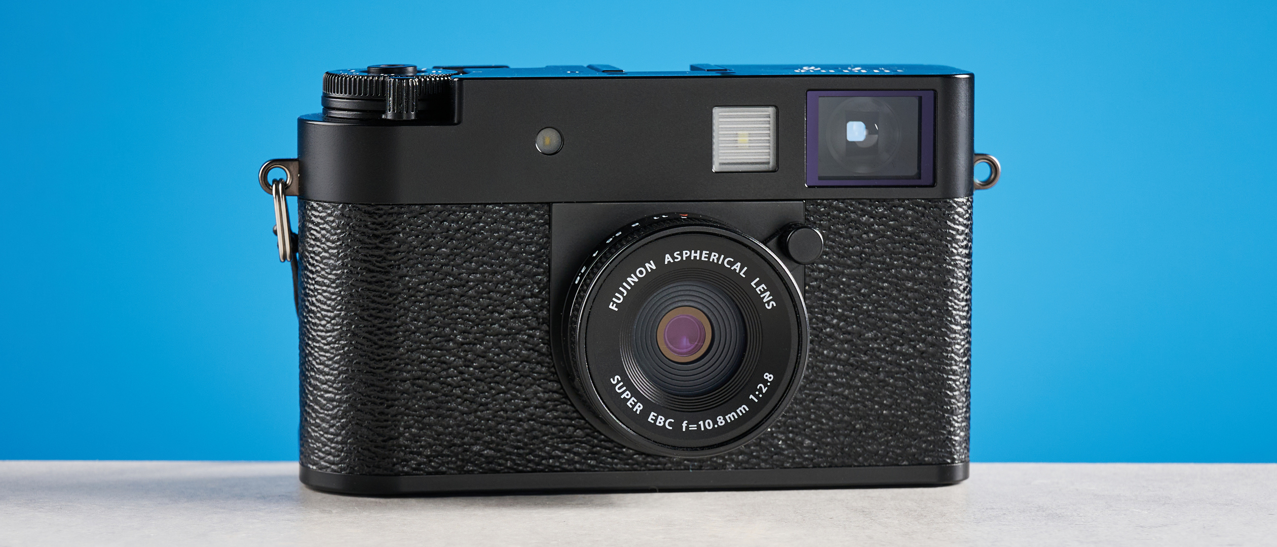 A black Fujifilm X half camera