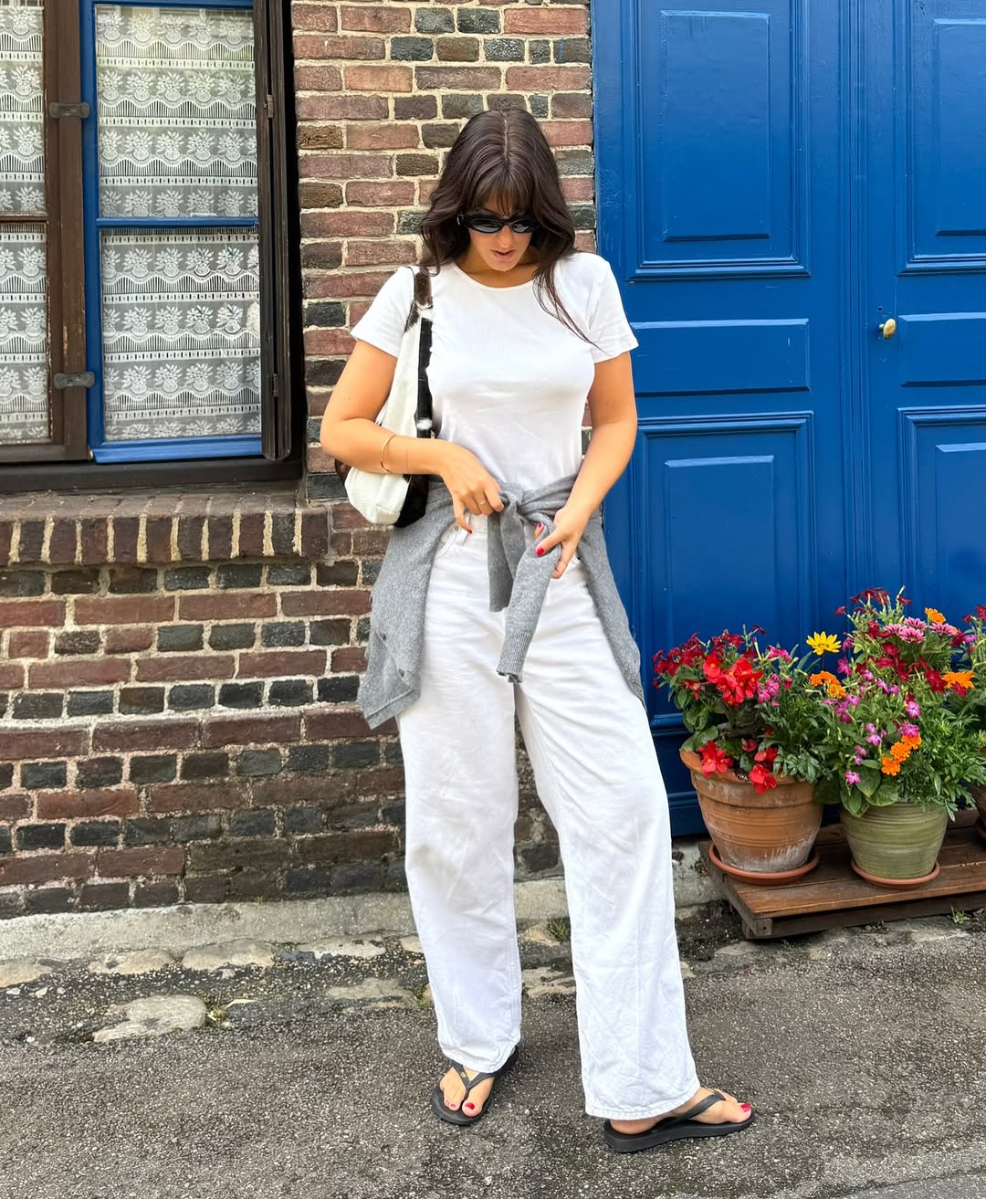 Diane wearing white jeans