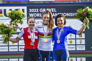 Pauline Ferrand-Prevot atop the podium at the UCI Gravel World Championships