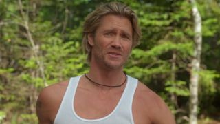 Chad Michael Murray as Cal Jones wearing a tank top in Sullivan's Crossing.