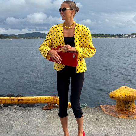 nina sandbech wearing a red bag