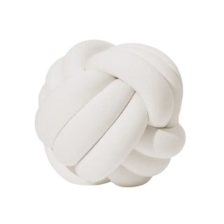 A white knot pillow
