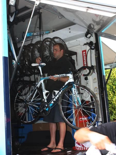 Trek team liaison Ben Coates weighs an Astana team bike to make sure it is exactly 6.8kg - and not a gram less.