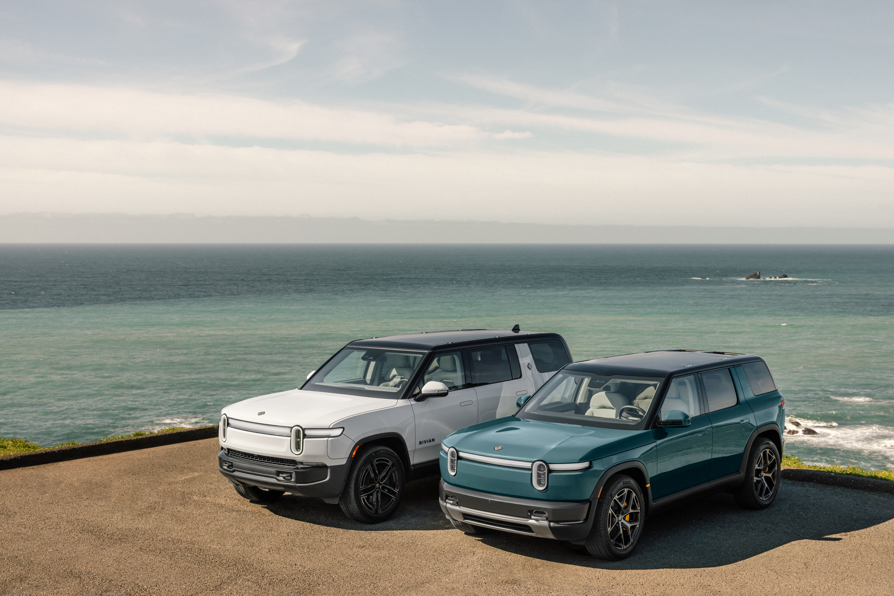 The new R2 (right) alongside the Rivian R1S