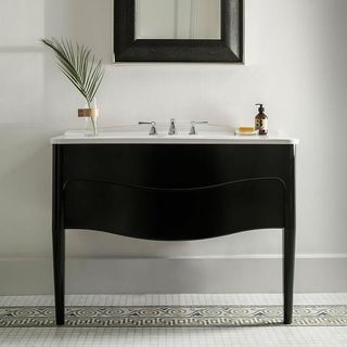 bathroom with black vanity unit by sanctuary bathrooms
