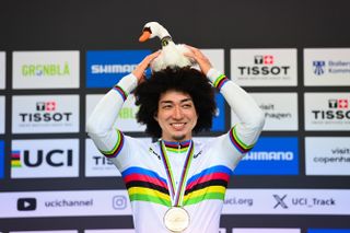 Kento Yamasaki with a swan toy on his head