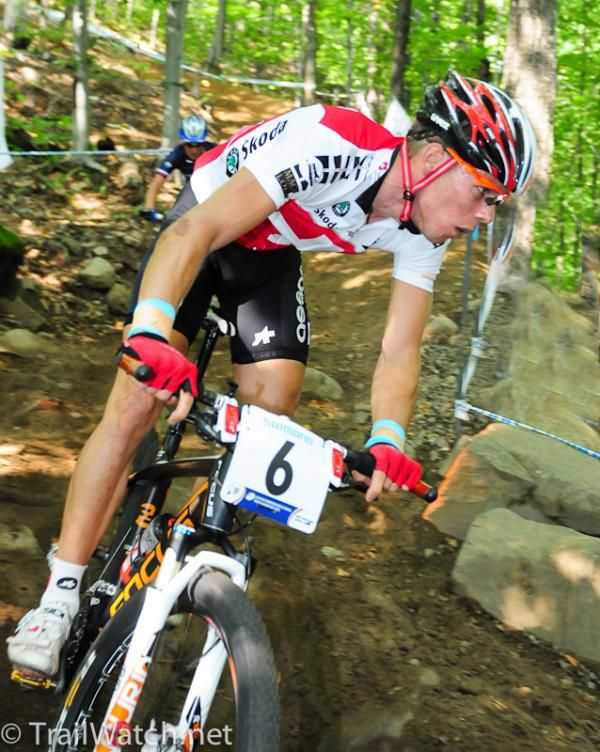Thomas Litscher (Switzerland) descends a wide, loose section of track