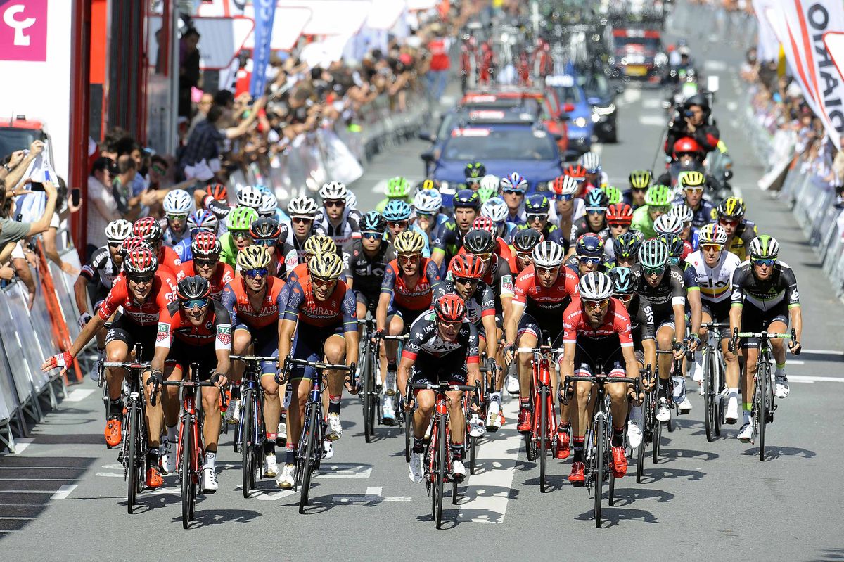 The pack rolling across the San Sebastian finish line
