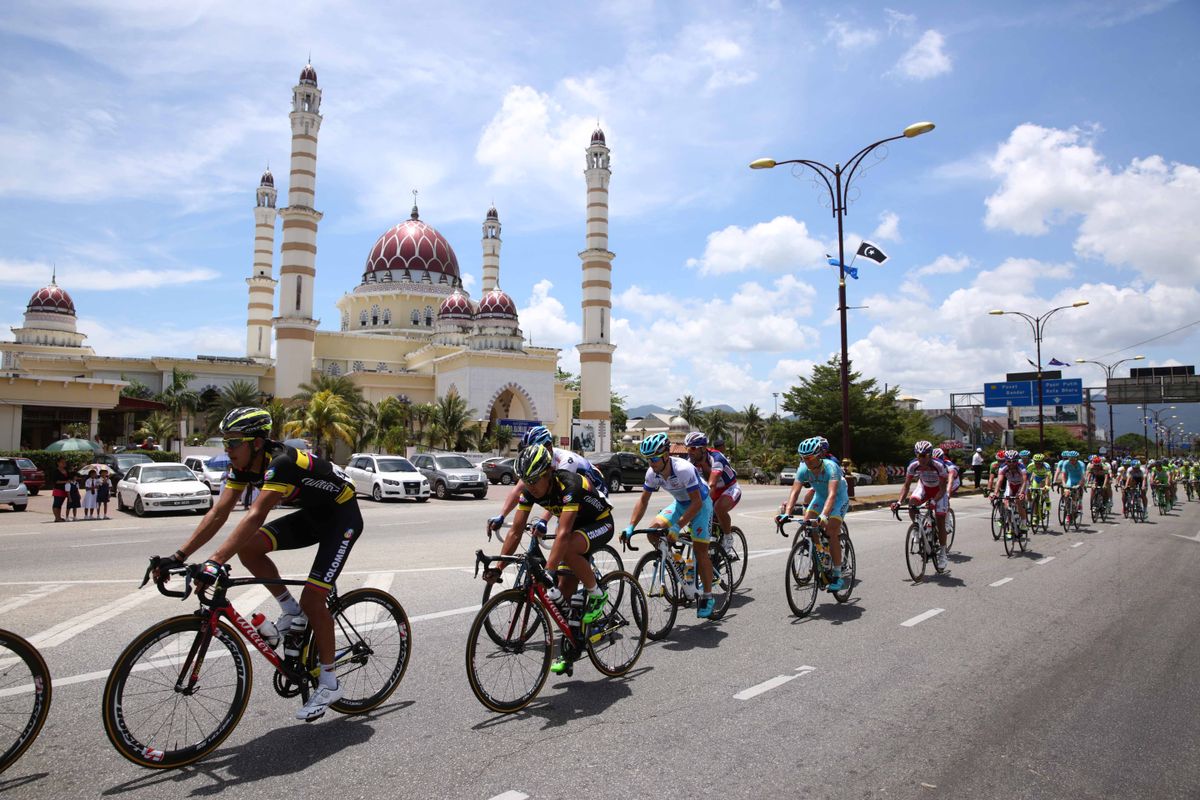 The peloton pass one of the country's many mosques
