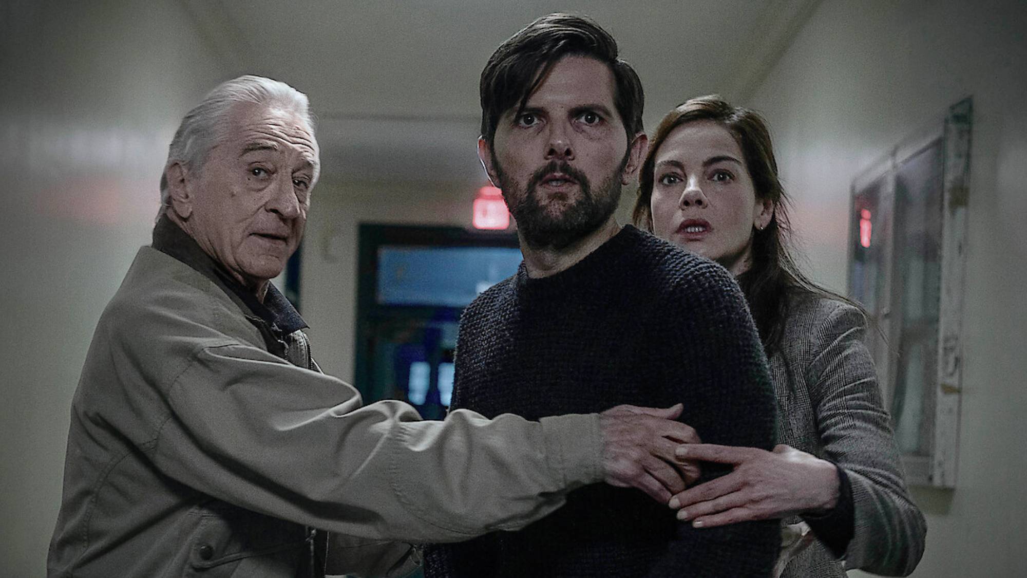 (L-R) Robert De Niro, Adam Scott and Michelle Monaghan in "The Whisper Man" on Netflix