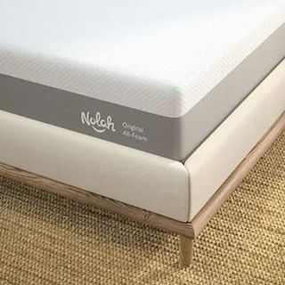 The corner of the Nolah Original Mattress on carpet.