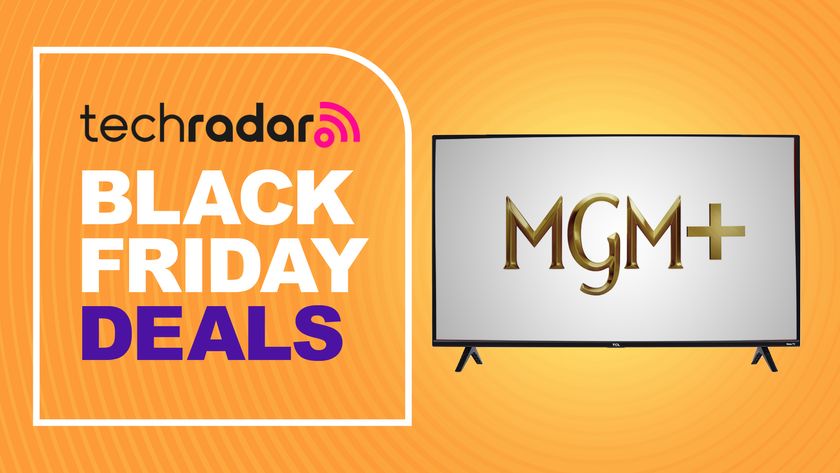 A Black Friday deals sign next to a TV displaying the MGM+ logo