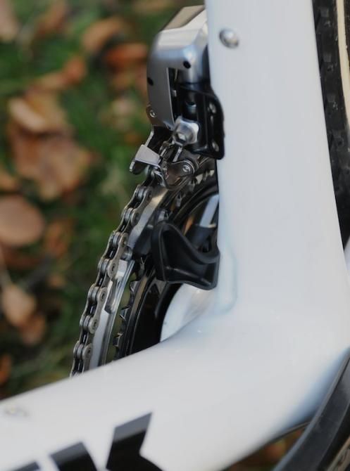 Despite the relative security of running a front derailleur, a chain catcher is still fitted to stop the chain escaping down the inside of the little ring.
