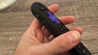 Roku Ultra (2024) remote held in hand