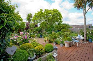 tiered decking with space for garden potted plants