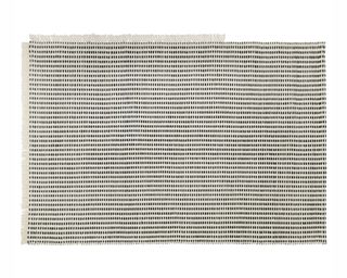 A black and white outdoor rug made from recycled plastic