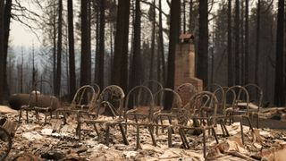 The fast-moving wildfire left communities in ruins.