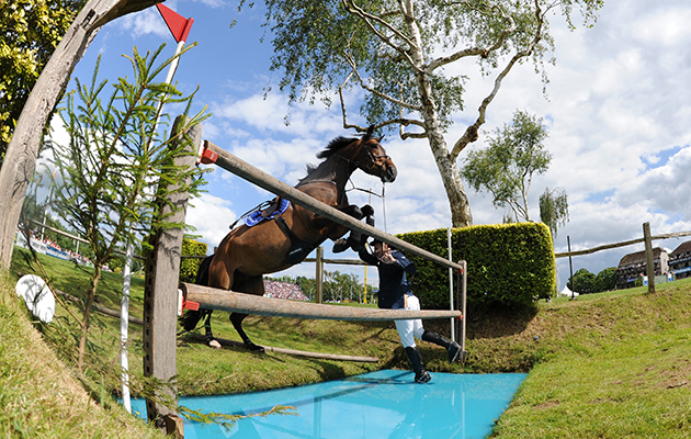 James Hughes GBR riding Peiter VI during The Equestrian.com Derby at The Equestrian.com Hickstead Derby Meeting in Sussex, UK 26-29th June 2014 Thrills and Spills fall falls falling