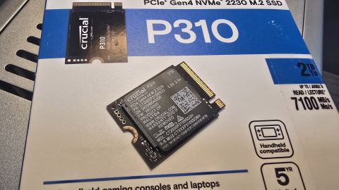 The Crucial P310 SSD on a box and installed in a motherboard.