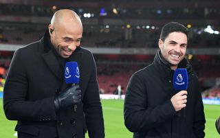 Arsenal manager Mikel Arteta speaks to all-time scorer Thierry Henry prior to the Premier League match between Arsenal FC and West Ham United at Emirates Stadium on December 28, 2023 in London, England.