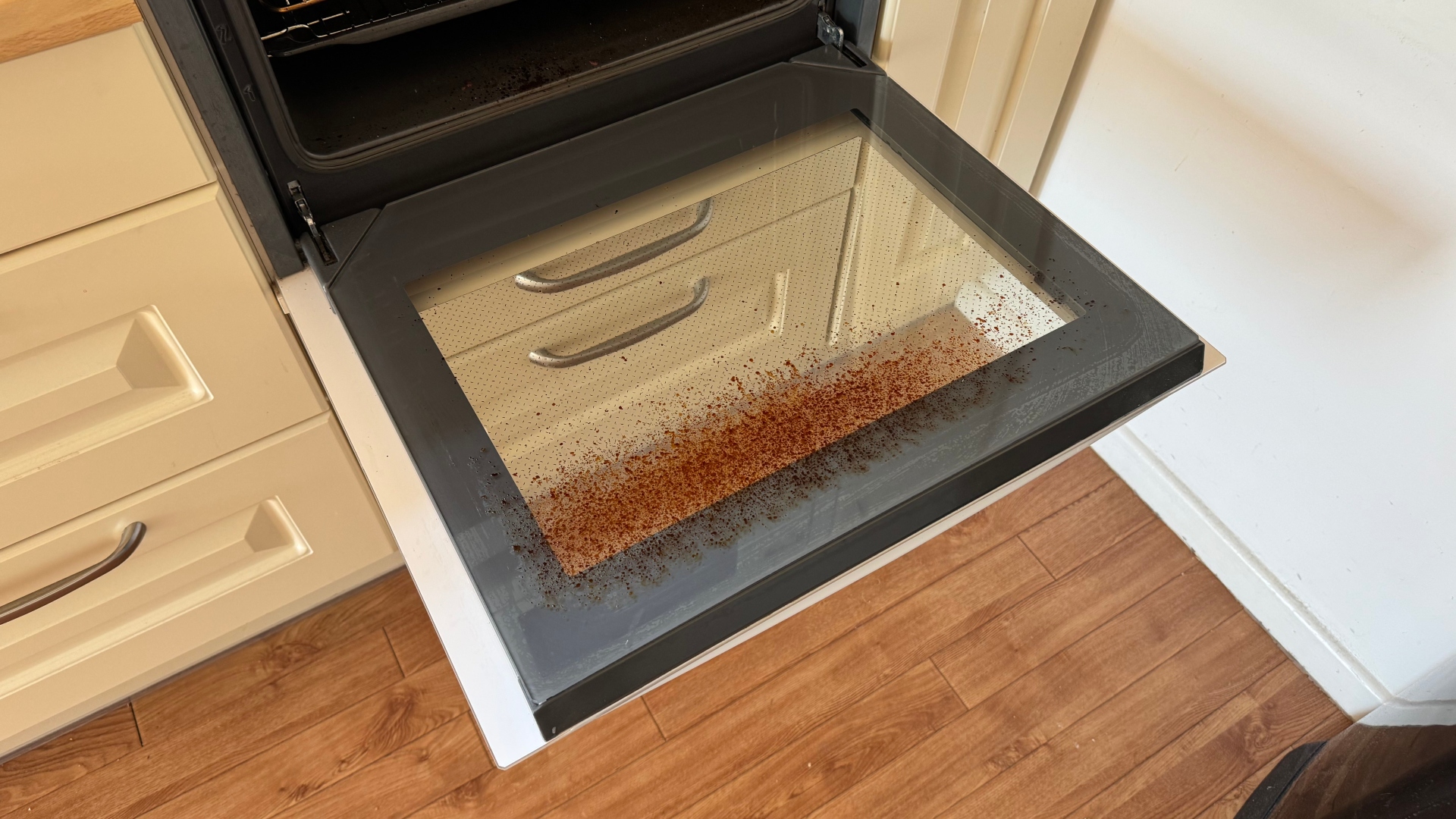 An oven door after cleaning