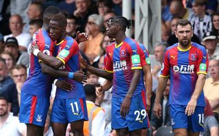 Wilfried Zaha, centre left, celebrates a goal with team-mates including Aaron Wan-Bissaka, centre