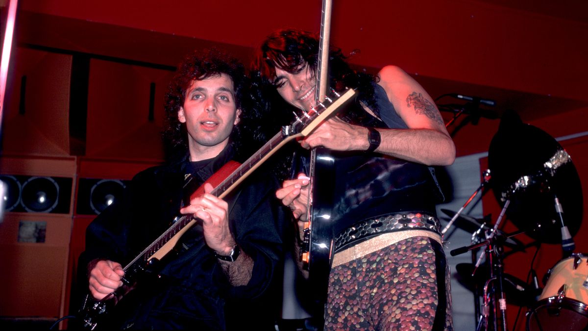 Joe Satriani (left) and Steve Vai perform onstage at the Limelight in Chicago, Illinois on June 27, 1987