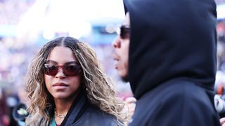 SANTA CLARA, CALIFORNIA - FEBRUARY 08: Jay-Z and daughter Blue Ivy Carter look onprior to the start of Super Bowl LX between the Seattle Seahawks and the New England Patriots at Levi's Stadium on February 08, 2026 in Santa Clara, California. (Photo by Kevin C. Cox/Getty Images)