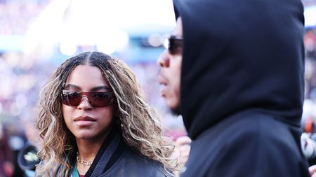 SANTA CLARA, CALIFORNIA - FEBRUARY 08: Jay-Z and daughter Blue Ivy Carter look onprior to the start of Super Bowl LX between the Seattle Seahawks and the New England Patriots at Levi's Stadium on February 08, 2026 in Santa Clara, California. (Photo by Kevin C. Cox/Getty Images)