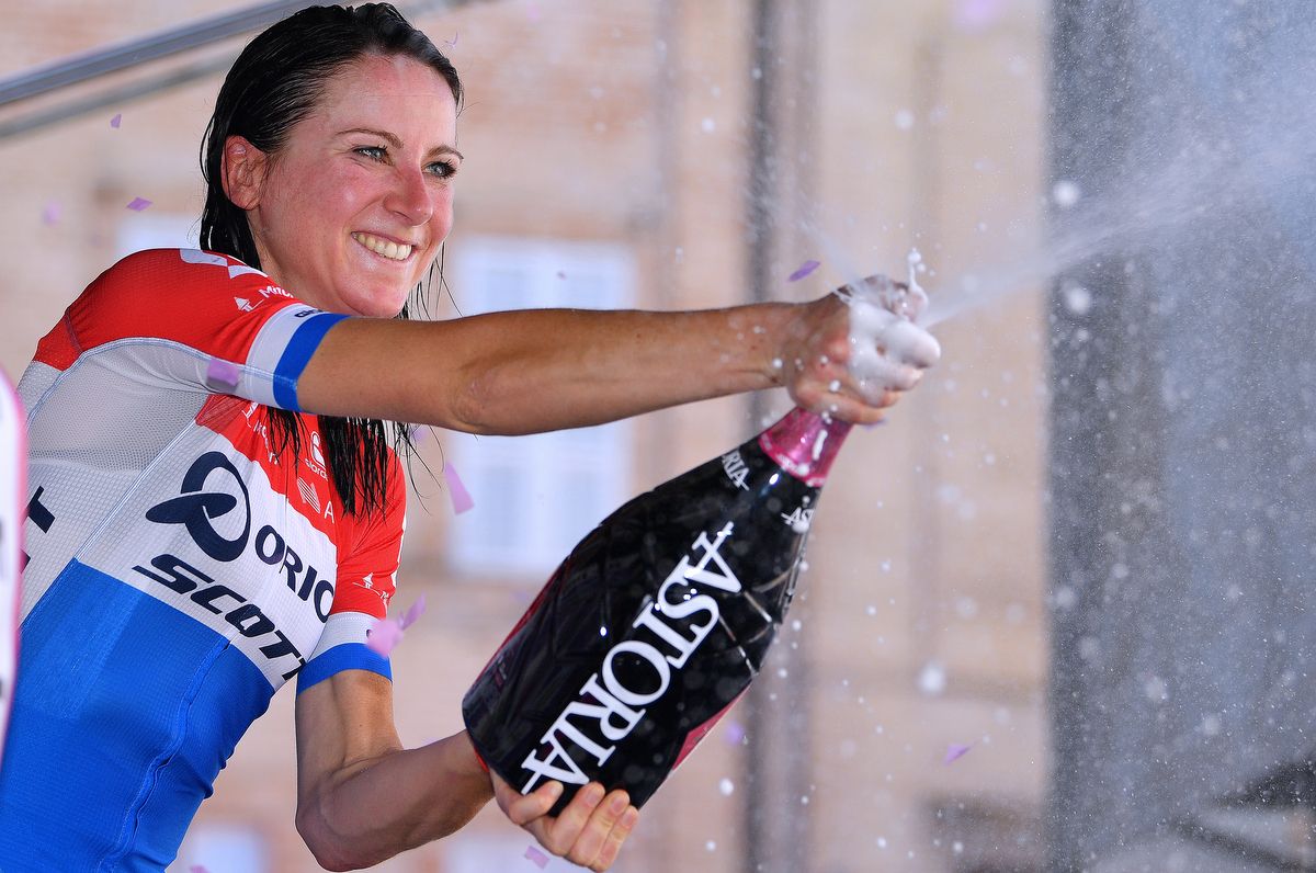 Annemiek van Vleuten (Orica-Scott) sprays the bubbles