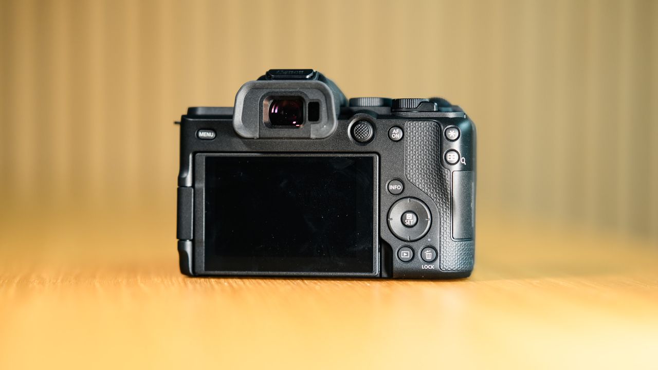 Rear of the Canon EOS R8 Mark II on a wooden table