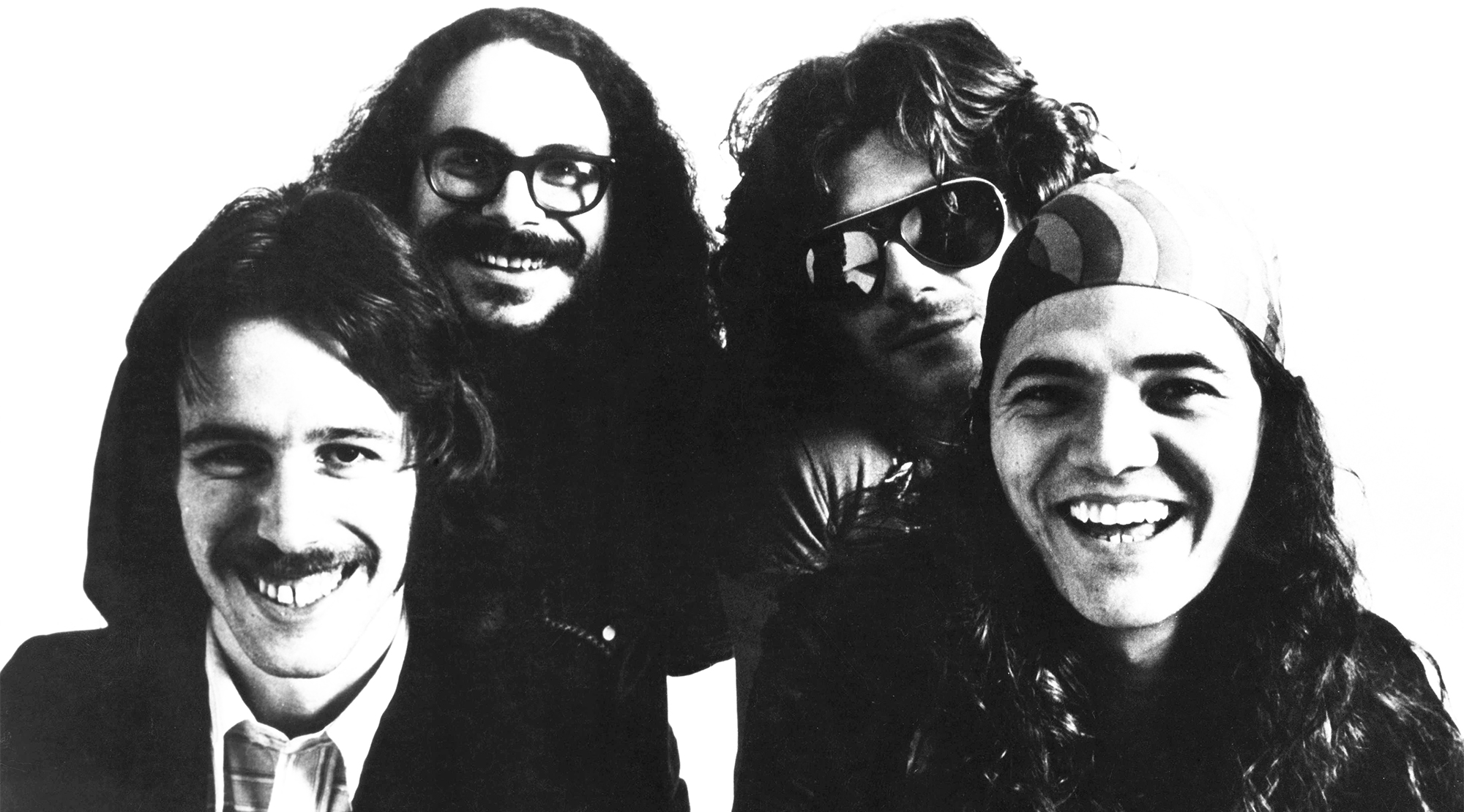 Photo of Tommy BOLIN and JAMES GANG circa 1973; with Tommy Bolin on the far right
