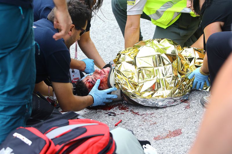 Domenico Pozzovivo (AG2R La Mondiale) receives medical attention after crashing hard