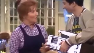 Carl on The Facts Of Life talking to Mrs. Garrett while holding a tape recorder.