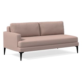 Pink sectional sofa on white background