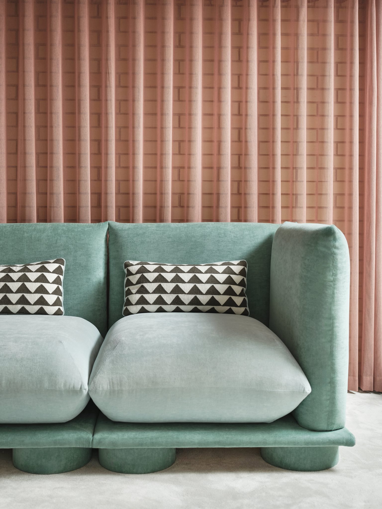 brick wall layered pink curtain mint sofa triangle cushion