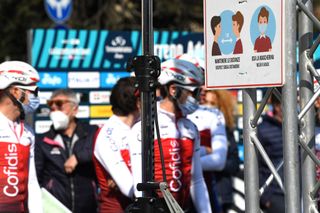 Mask and Covid safety measures were in place before a stage start of 2022 Tirreno-Adriatico