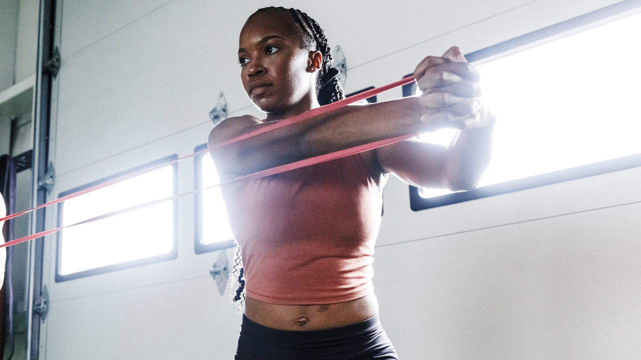 Woman using a reistance band