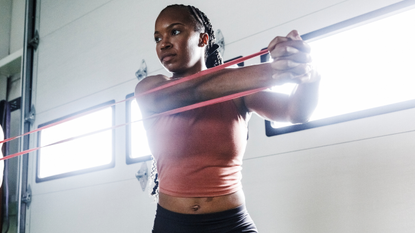 Build upper body muscle with a resistance band and these two simple  supersets