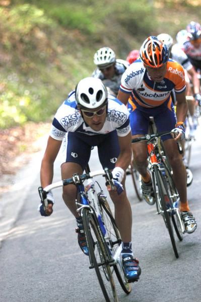 Michael 'Boogie man' Boogerd tries to keep the wheel of Bartoli on the Mur.