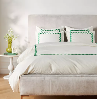 Anthropologie contemporary white bed set with green pattern